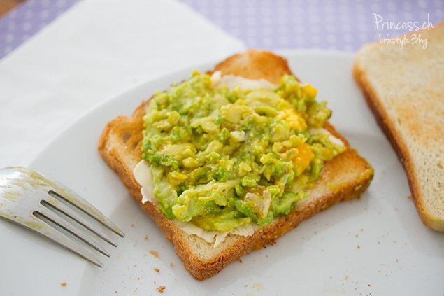 Baked Eggs in Avocado with Bacon on Toast