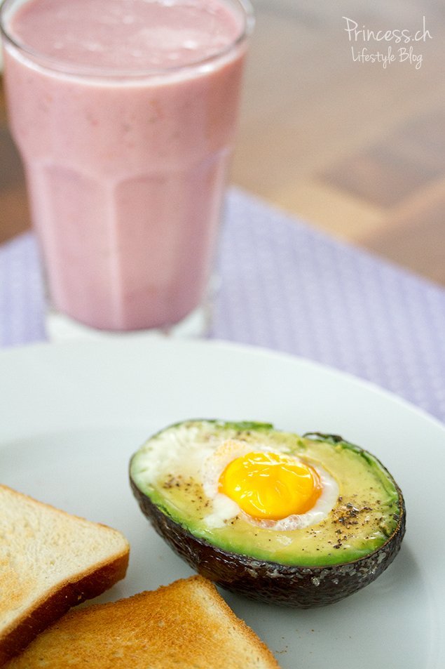 Baked Eggs in Avocado with Bacon on Toast