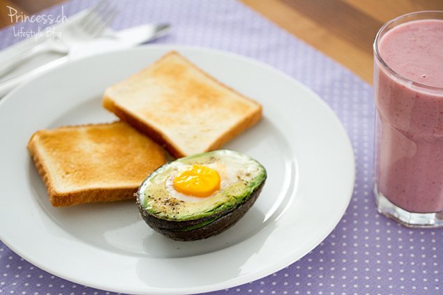 Baked Eggs in Avocado with Bacon on Toast